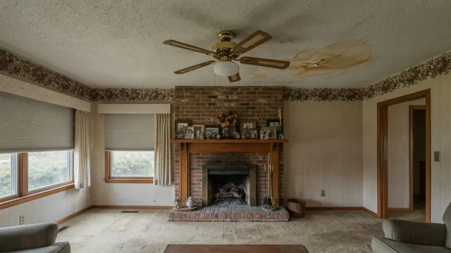 Living room divided by a wall, before renovation